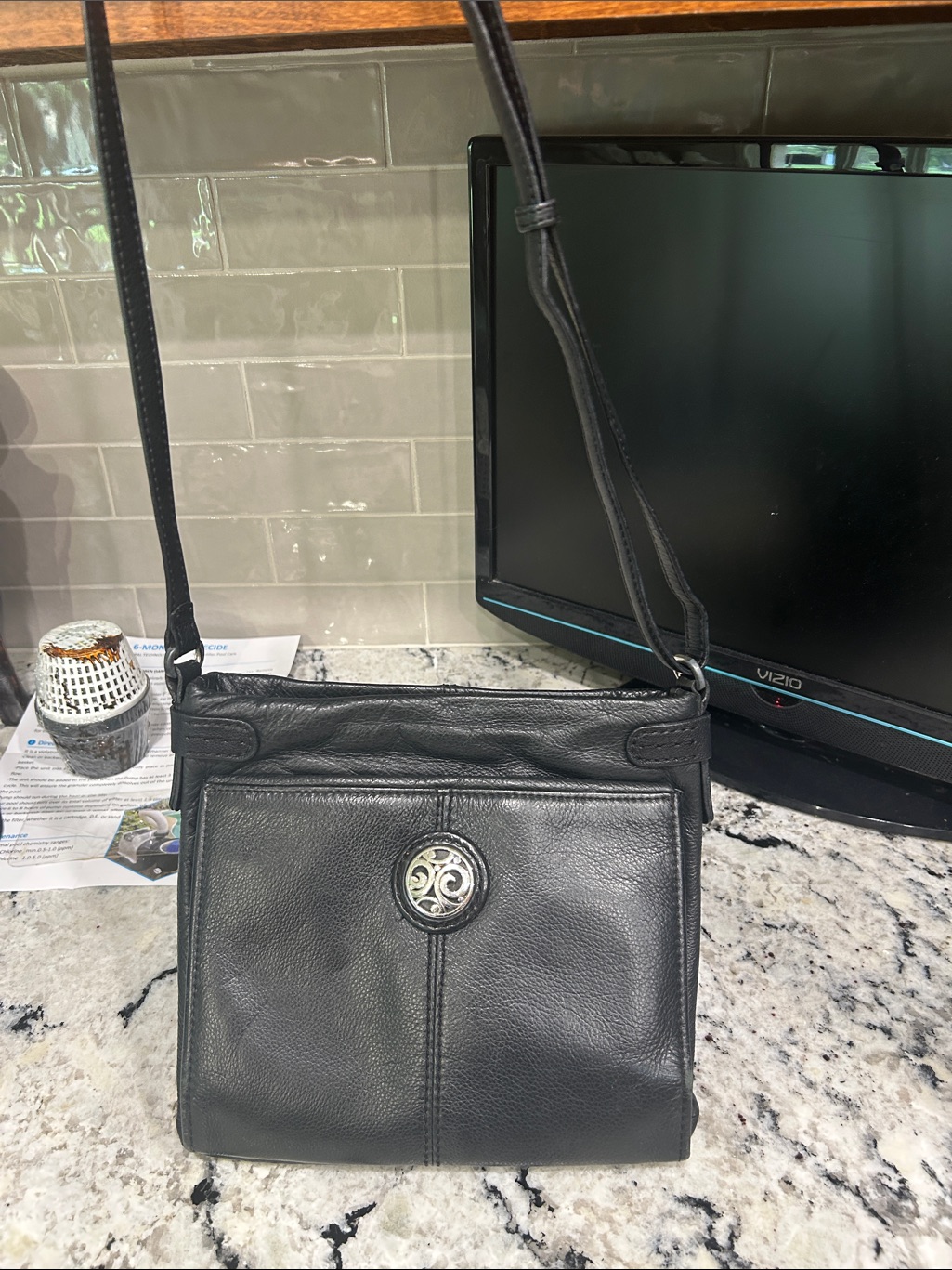Black Leather Crossbody Messenger Bag With Silver Medallion